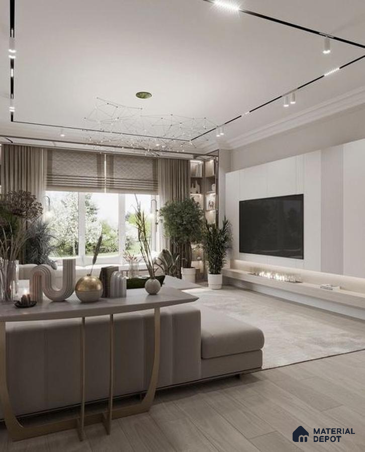 A kitchen with marble counter tops and wooden cabinetry, along with an island in the middle of the middle of the island with stairs leading to shop & more counter top space to an island in the middle of